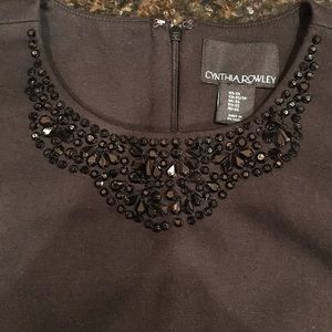 Black stretch knit beaded collar blouse